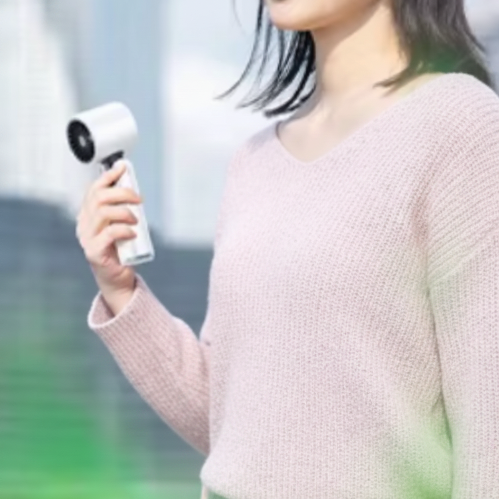 Ora  Pink Handheld Fan – 100-Speed Portable Cooling Device